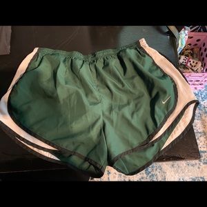 Green Nike shorts